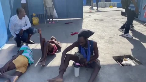 Several killed after gang attack on Haiti's largest prison, Port-au-Prince, HT - Stock Footage 266749237