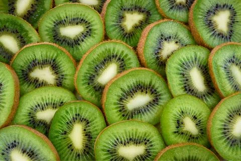 Several kiwi halves Stock Photos