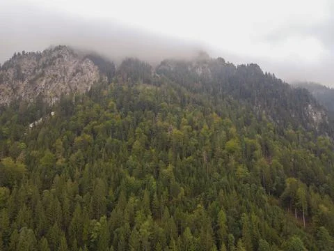 Several layers of mountains, viewed from high mountains are with light fog. Stock Photos