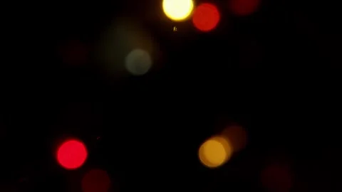 Several lights  flashing in black background Stock Footage 250486267