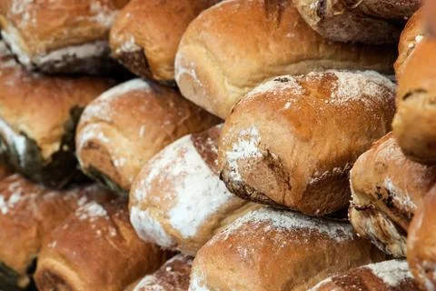Several loafs of bread in a pile Stock Photos