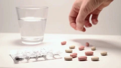 Several Many multi Pills on isolated white modern background medicine healthcare Video stock 336586381