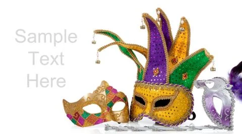 Several mardi gras masks on white with copy space Stock Photos