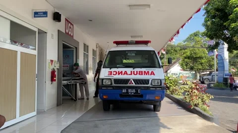Several medics or nurses were dropping patients from the ambulance Stock-Footage 347543496