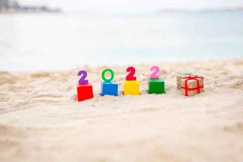Several multi-colored cubes with the numbers of the year 2022 Stock Photos