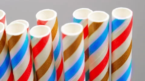 Several multicolored striped cocktail tubes, camera movement Stock Footage 144047538