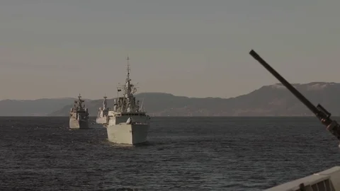 Several navy ships navigating in the open ocean Stock Footage 114084570