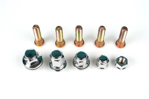 Several nuts and studs for installing the wheel on the car Foto stock