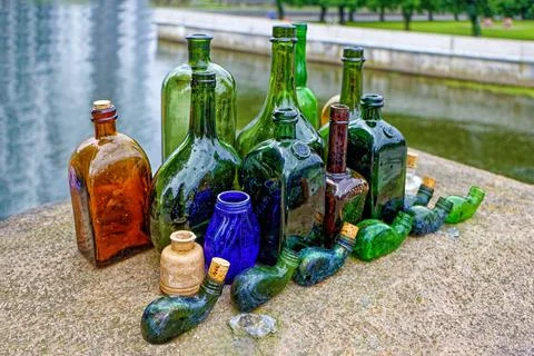 Several old German bottles made of multicolored glass Stock Photos