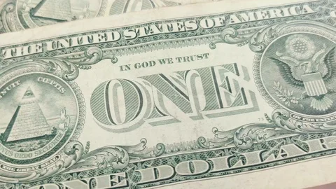 Several One Dollar banknotes rotating in the frame. Видео 122924767