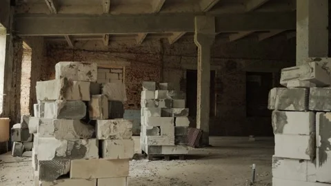 Several pallets with destroyed building blocks on the construction site. Stock Footage 250011298