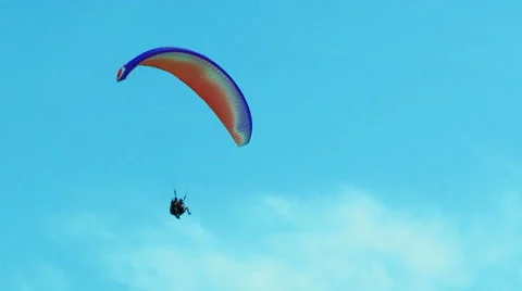 Several Paragliders Soaring In Blue Sky Stock Footage 47841445
