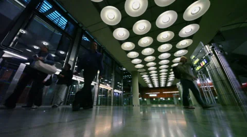 Several passenger walk out from elevator in hall of Airport Stock Footage 31204950
