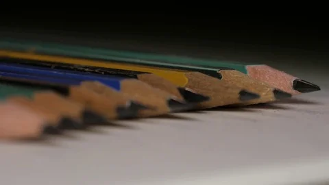 Several pencils aligned macro 4k Stock Footage 72400572