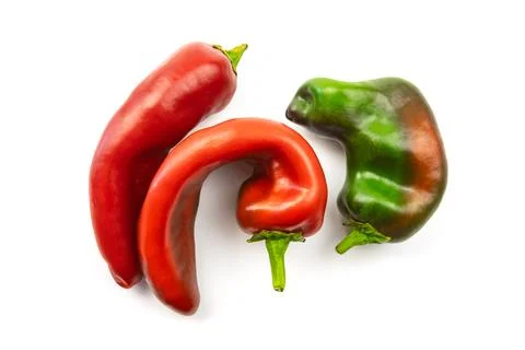 Several peppers isolated on a white background Stock-Fotos