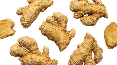 Several pieces of dried ginger root, scattered pattern on white background,.. Fotos Stock