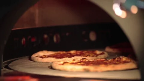 Several pizzas rotating Stock Footage 80897771