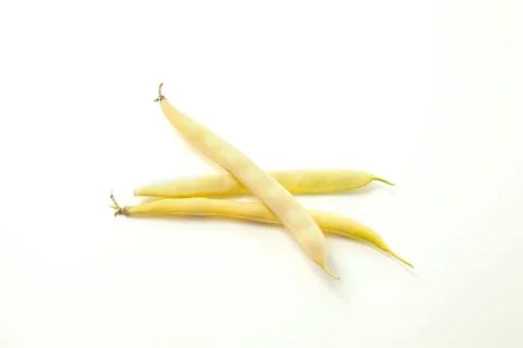Several pods of flat runner bean heap isolated on white background. . Stock Photos