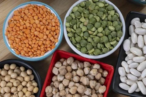 Several pots with raw grains for preparing healthy food Stock-Fotos