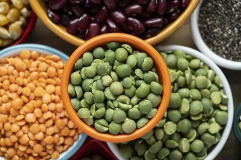 Several pots with raw grains for preparing healthy food Stock Photos
