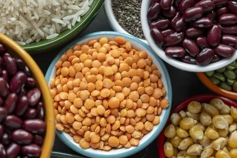 Several pots with raw grains for preparing healthy food Stock-Fotos