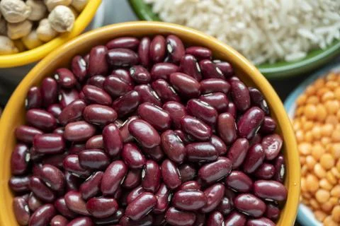 Several pots with raw grains for preparing healthy food Stock Photos