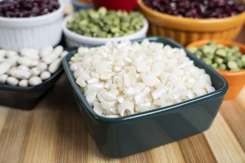 Several pots with raw grains for preparing healthy food Foto stock