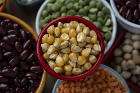 Several pots with raw grains for preparing healthy food Stock Photos
