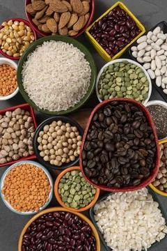 Several pots with raw grains for preparing healthy food Foto stock