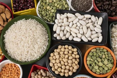 Several pots with raw grains for preparing healthy food Stock-Fotos