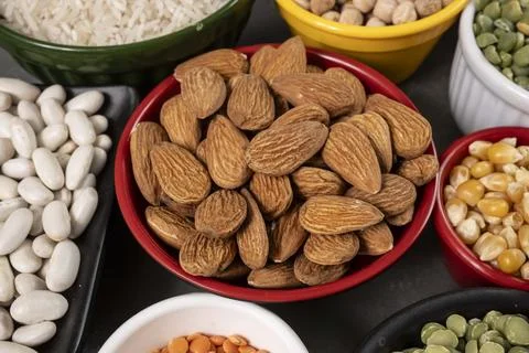 Several pots with raw grains for preparing healthy food Stock-Fotos