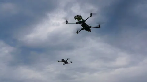 Several quadrocopter on a background of clouds Stock Footage 38298541