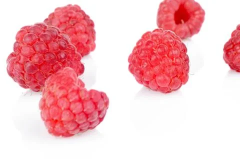 Several raspberries on table white background Stock Photos