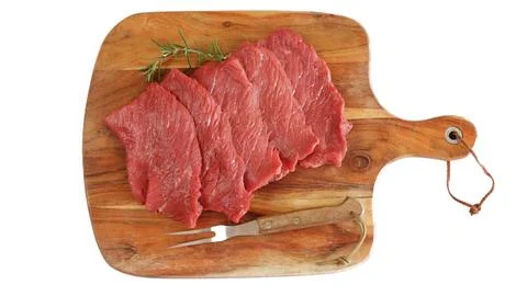 Several raw beef steaks, close-up, on a white background Foto stock