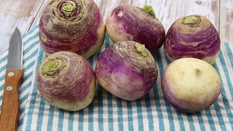 Several raw turnips on a table	 Stock Footage 164585905