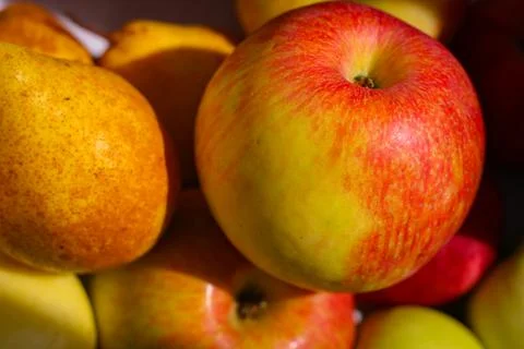 Several red-green apples standing on top of each other Stock Photos
