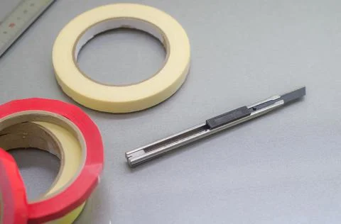 Several rollers of adhesive tape for different purposes. Paint and duct tape Stock Photos