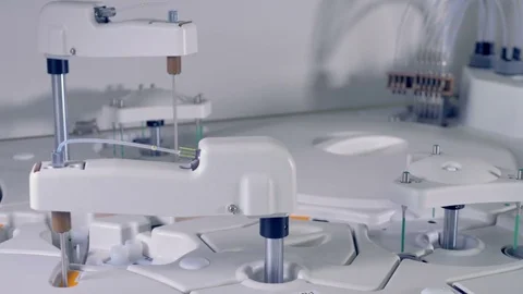 Several sample probes test blood in a clinical analyzer. Stock Footage 84092248