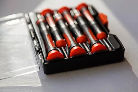 Several screwdrivers in one set, plastic box with open lid included Stock Photos