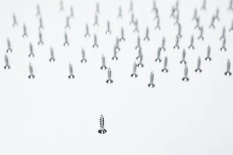 Several screws on a white background Stock Photos