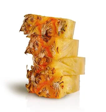 Several slices of pineapple in stack isolated on white Stock Photos