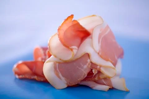 Several slices of raw ham Foto stock