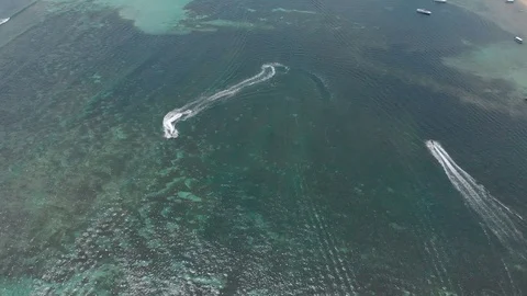 Several speed boats rides on the clear tropical sea - aerial view. Stock Footage 103522983