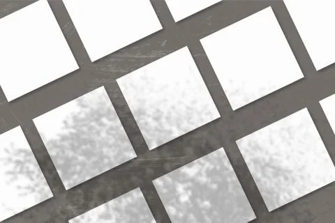 Several square sheets of white textured paper against a grey wall background. Stock Illustration