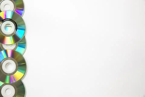 Several Stacked dvds on white background Stock Photos
