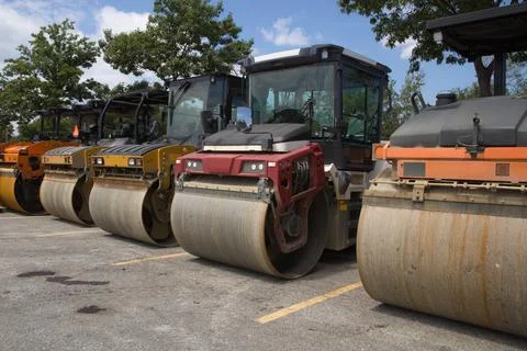 Several steamrollers on road construction site heavy equipment asphalt paving Stock-Fotos