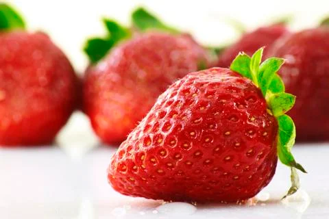 Several strawberry in a white background Stock Photos