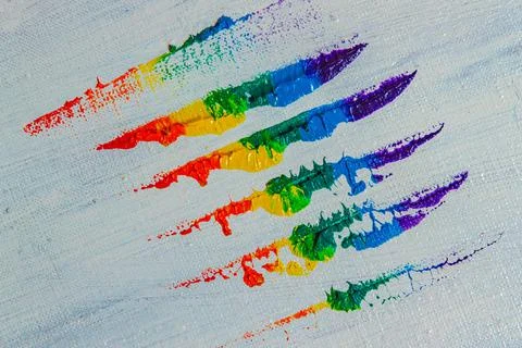 Several strokes of multi-colored paint depict a frag of the LGBT community on Foto stock
