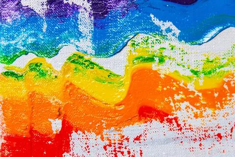 Several strokes of multi-colored paint depict a frag of the LGBT community on Stock Photos