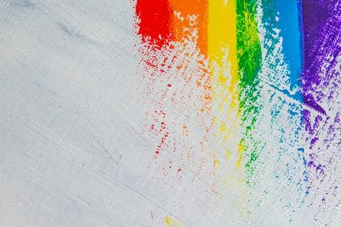 Several strokes of multi-colored paint depict a frag of the LGBT community on Stock Photos